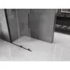 A modern bathroom with a walk-in shower and sleek tiling. Podgląd zdjęcia produktu