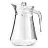 A clear glass pitcher with a lid and handle, isolated on a white background. Podgląd zdjęcia produktu