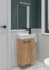 A small bathroom vanity with a sink and faucet, a mirror with a light above it, and a towel hanging on the side. Náhled obrázku produktu