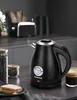 A black electric kettle is shown on a kitchen counter next to a sandwich and a cup of coffee, with a toaster in the background. Produktbild-Vorschau