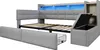 A modern upholstered daybed with integrated storage and LED lighting. Produktbild-Vorschau