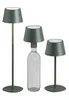 Three green lamps of different sizes are displayed against a white background. One lamp is tall and slender, another is shorter and sits on a clear bottle, and the third is the smallest and sits on a thin stem. Produktbild-Vorschau
