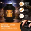 A black infrared heater with an orange glowing element, set on a stone patio at night with fairy lights in the background. Text overlays describe features and operation. Anteprima dell’immagine prodotto