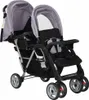 A tandem stroller is shown against a white background. Náhled obrázku produktu
