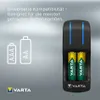 A VARTA battery charger with two VARTA rechargeable batteries inserted, shown against a gradient gray background with text and icons. Voir les images du produit
