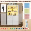 A white high-gloss display cabinet with LED lighting, showcasing decorative items. The image also includes color swatches and a remote control. Produktbild-Vorschau