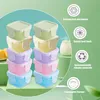 Stacks of small, colorful food storage containers with lids, presented with marketing icons and text. Produktbild-Vorschau
