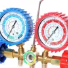 A close-up shot of a dual-gauge manifold set for air conditioning systems. Náhled obrázku produktu