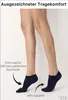 Close-up shot of a person's legs wearing navy blue ankle socks. Produktbild-Vorschau