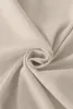 A close-up of beige fabric, folded and swirled. Podgląd zdjęcia produktu