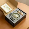 A matcha tea set is neatly arranged in a box, ready for use. Produktbild-Vorschau
