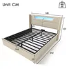 A beige upholstered bed frame with LED lighting in the headboard, shown with dimensions indicated. Produktbild-Vorschau