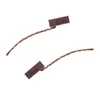 Two carbon brushes with copper wires are shown against a white background. Produktbild-Vorschau