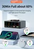 A fast charging hub with multiple ports and a wireless charging pad, shown with a smartphone and earbuds charging. Produktbild-Vorschau