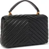 A black quilted leather handbag with a top handle and a gold logo. Voir les images du produit