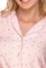 Close-up of a person wearing a pink polka dot pajama top. Produktbild-Vorschau