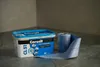 A container of Ceresit CL 51 Express waterproofing compound and a roll of waterproofing tape are placed on a tiled surface. Produktbild-Vorschau
