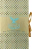 A close-up of a perfume box with a gold background and blue star pattern. Podgląd zdjęcia produktu
