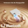 A white projector is shown with a blue light beam, surrounded by a pair of headphones and earbuds, on a swirling brown background. Podgląd zdjęcia produktu