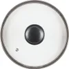 A top-down view of a glass pot lid with a metal rim and a dark gray handle in the center. Náhľad obrázku produktu