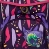 A close-up view of a backpack's front pocket with a colorful jungle-themed pattern and a clear plastic charm featuring a chameleon. Produktbild-Vorschau
