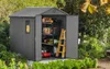 A garden shed filled with tools and equipment, set in a garden. Náhled obrázku produktu