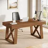 A wooden desk in a home office setting with a laptop, lamp, and flowers. Anteprima dell’immagine prodotto