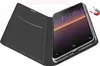 A black flip case for a smartphone is shown open, with the smartphone inside. The case has a card slot and indicator lights. A magnet icon is shown near the phone. Produktbild-Vorschau