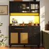 A black kitchen buffet with gold accents, featuring glass-fronted cabinets and rattan-style doors. Podgląd zdjęcia produktu