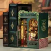 A miniature bookstore diorama designed to fit between books on a shelf. Produktbild-Vorschau