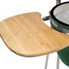 A close-up view of a bamboo side table attached to a green ceramic grill. Produktbild-Vorschau