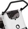 A close-up view of the handle and top section of a child trailer/stroller. Produktbild-Vorschau