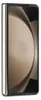 A folded smartphone with a black case and a gold side. Podgląd zdjęcia produktu
