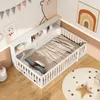 A child's bed with a bookshelf headboard in a nursery or bedroom. Produktbild-Vorschau