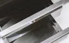 A close-up view of two stacked stainless steel drawers or shelves, likely part of an outdoor kitchen or grill. Produktbild-Vorschau