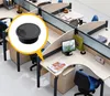 An office cubicle setup with multiple desks and chairs, featuring a close-up inset of a black cable grommet. Podgląd zdjęcia produktu