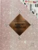 A sparkly pink background with a diamond-shaped graphic in the center containing text. Voir les images du produit