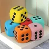 A group of colorful dice arranged on a surface. Produktbild-Vorschau