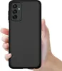 A hand holding a black smartphone case. Podgląd zdjęcia produktu