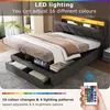 A bed with storage drawers and LED lighting, shown with a remote control. Produktbild-Vorschau