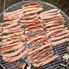 Sausages cooking on a grill. Anteprima dell’immagine prodotto