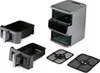 An air fryer and its accessories are displayed against a white background. Anteprima dell’immagine prodotto