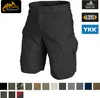 A pair of black tactical shorts is shown from the front, with various color swatches below. Náhled obrázku produktu