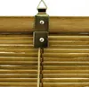 A close-up view of the top mounting hardware and cord of a bamboo blind. Produktbild-Vorschau