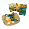 A board game with colorful tokens and cards laid out on a neutral background. Produktbild-Vorschau