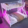 A white metal bunk bed with LED lighting in a modern bedroom setting. Náhled obrázku produktu