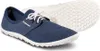 A pair of blue casual shoes with white laces and soles, shown from a slightly elevated side angle. The sole of one shoe is visible in the background. Produktbild-Vorschau