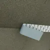 A close-up of a roll of tape being applied to a surface. Produktbild-Vorschau