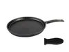 A cast iron tortilla pan and a black handle grip are displayed on a white background. Produktbild-Vorschau