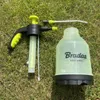 A garden sprayer and its components laid out on grass. Anteprima dell’immagine prodotto